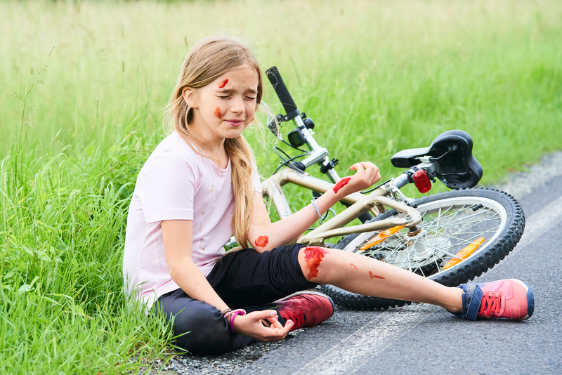 Little girl fall off the bicycle